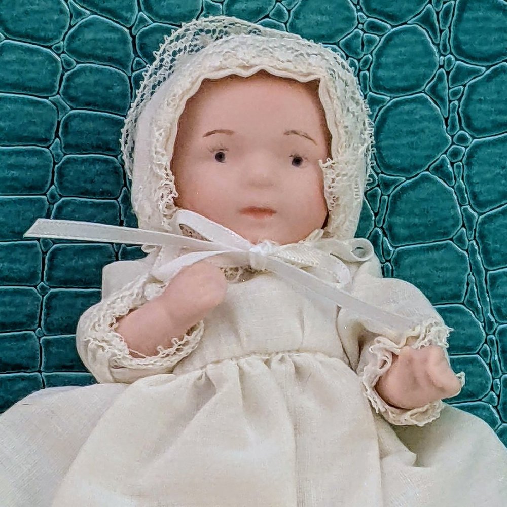 Victorian-style artisan baby doll porcelain linen garments embroidered w/ rose